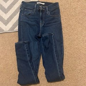 Levi high rise super skinny jeans.